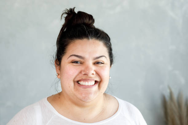 istock Beautiful woman smiling looking at camera 1333973813