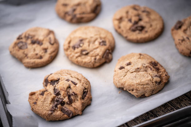 istock traditional chocolate chip cookie on cooking pan 1333975841