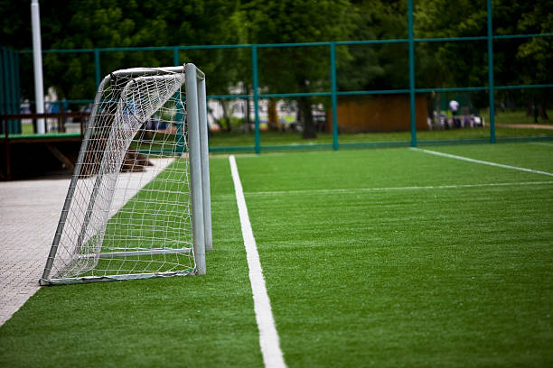 football goal - soccer soccer field grass american football stock-fotos und bilder