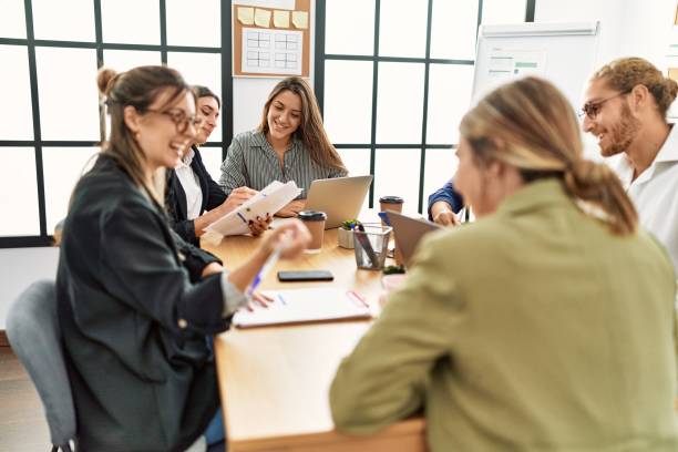 istock Group of business workers smiling happy working at the office 1333976588