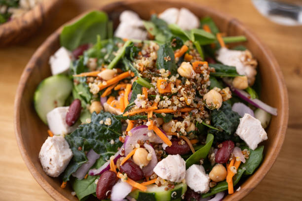 istock healty salad with chicken and quinoa, red bean, chickpeas 1333978020