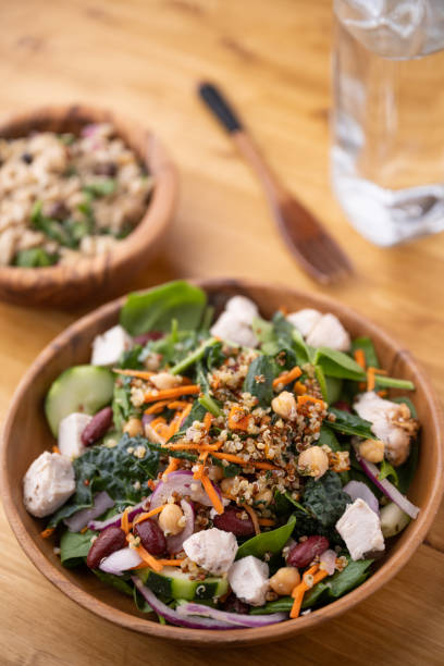 istock healty salad with chicken and quinoa, red bean, chickpeas 1333978149