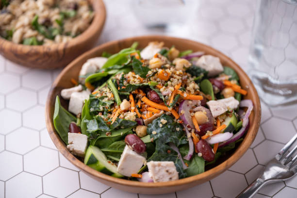 istock healty salad with chicken and quinoa, red bean, chickpeas 1333978224