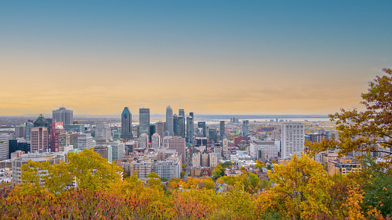 Toronto, Canada - May 13, 2023: The CN Tower stands tall against a backdrop of modern city buildings. The downtown is a tourist attraction