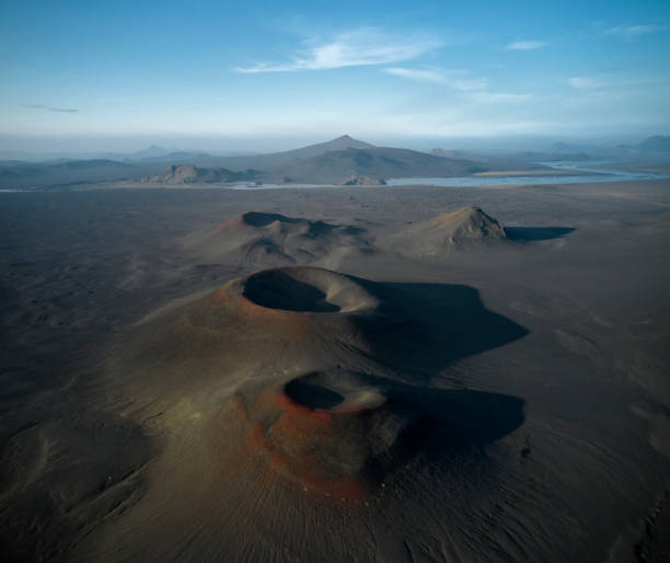 istock Volcanic desert near river in nature 1333982087