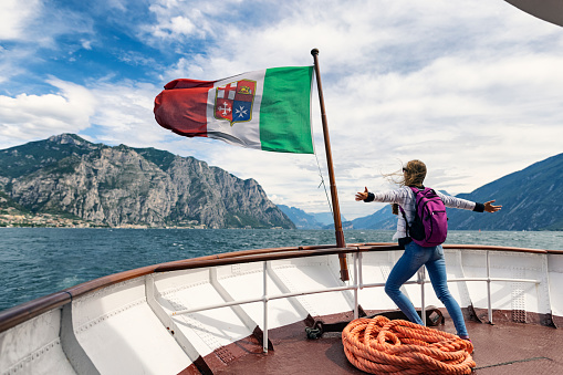 Teenage girl enjoying ferry boat ride on Lake Garda. The girl is travelling from Limone to Malcesine.
Canon R5