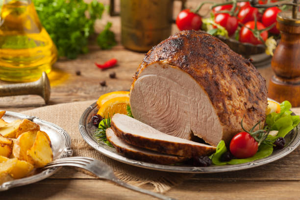istock Baked ham, served on an old plate. 1333984067