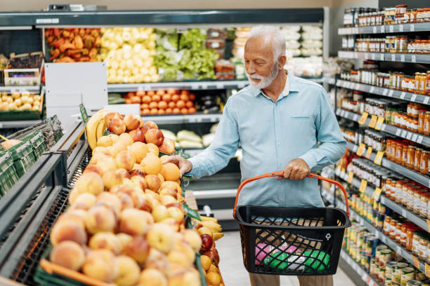istock Retired man buying groceries 1333984991