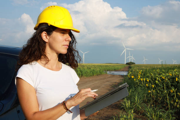 istock Portrait of a female environmentalist, inspecting wind turbines 1333990849