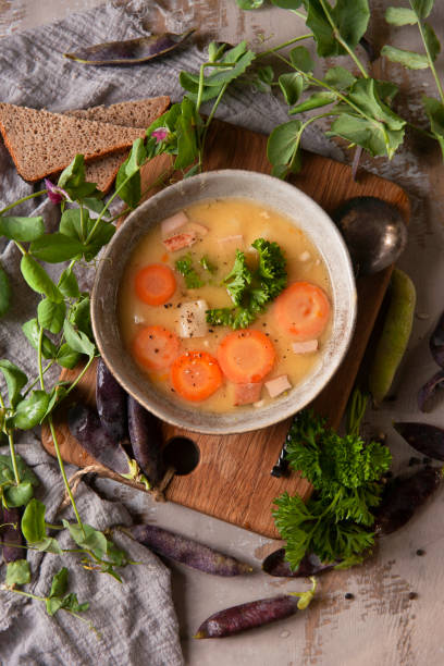 istock Fresh homemade made split pea soup on grey background in country rustic kitchen, flat lay 1333994143
