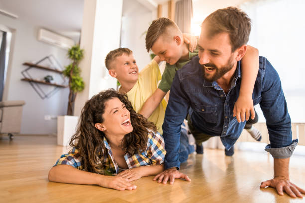 istock Joyful family playing at home. 1333995198