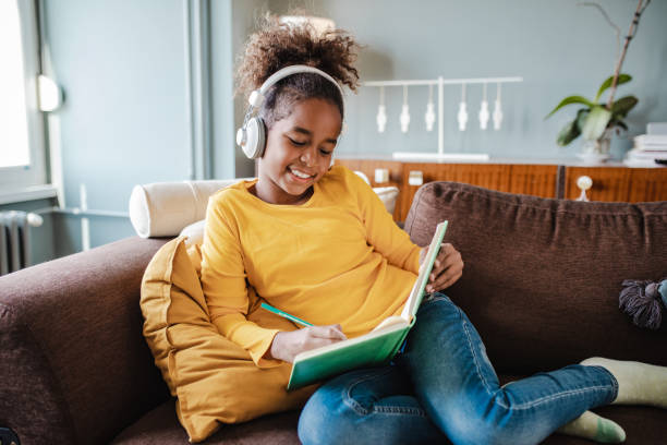 istock A little girl is writing homework 1333995877