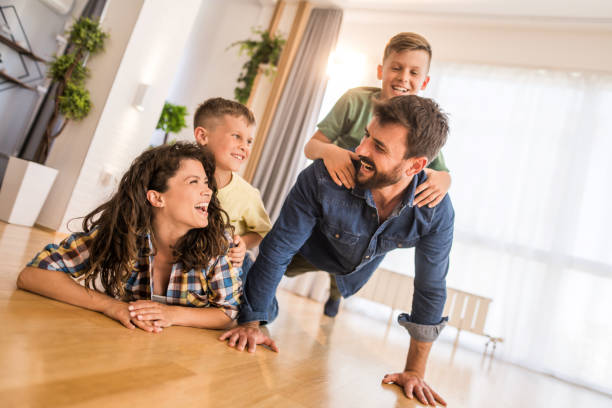 istock Joyful family playing at home. 1333995930