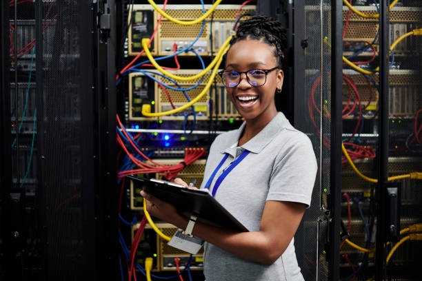 istock Portrait of a young woman holding a clipboard while working in a server room 1334005178