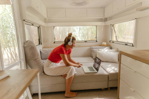 Having a conference call while sitting in the recreational vehicle