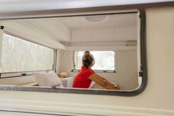 istock Listening music while relaxing in a camper van 1334009949