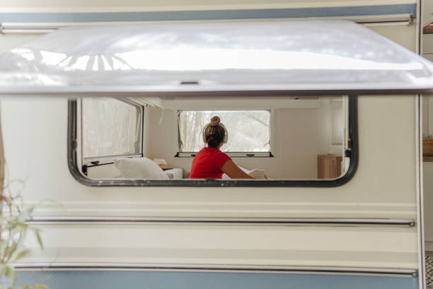 istock Listening music while relaxing in a camper van 1334009966