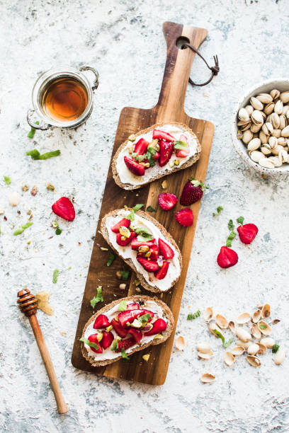 istock Sandwich with strawberries, soft cheese and honey 1334013404