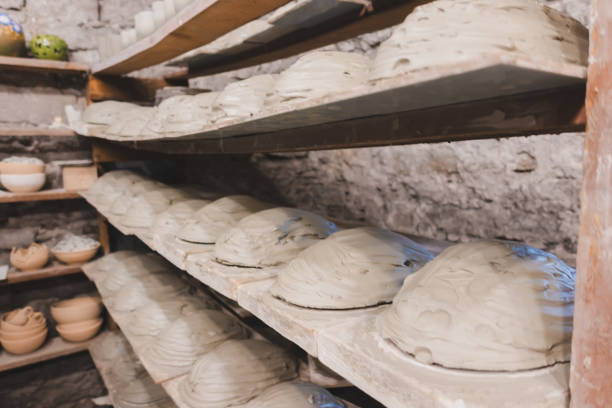 istock Raw soaked clay lies on a shelf in a row 1334023122