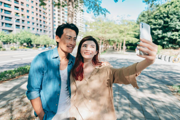 istock An Asian couple in the park 1334026329