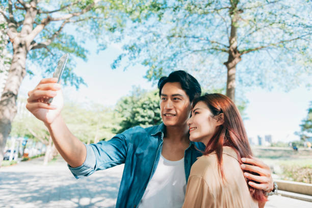 istock An Asian couple in the park 1334026333