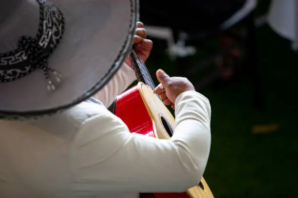Details of the mariachi playing during an event.