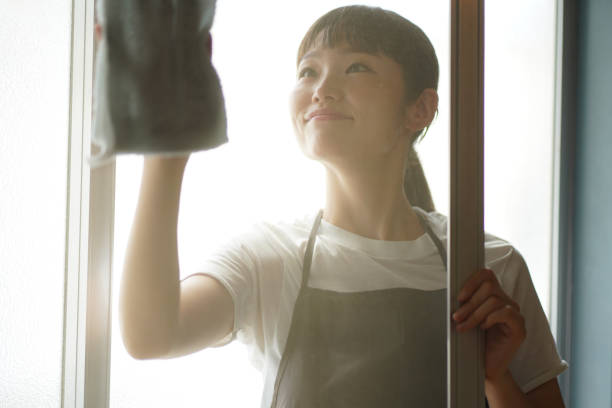 istock A woman cleaning a screen door 1334032737