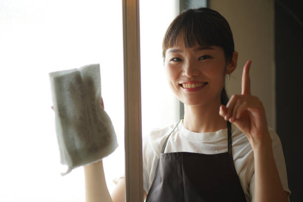 istock A woman cleaning a screen door 1334032739