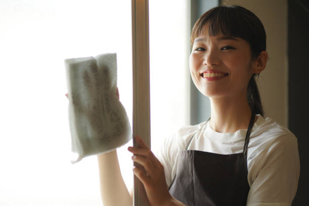 istock A woman cleaning a screen door 1334032749