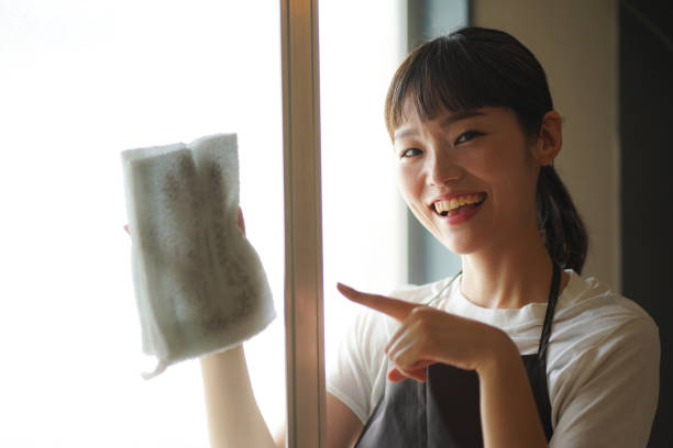 istock A woman cleaning a screen door 1334032755