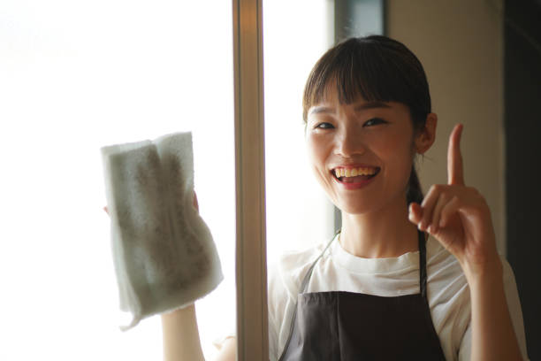 istock A woman cleaning a screen door 1334032764