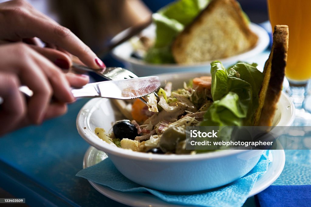Healthy eating Woman eating healthy food, selective focus, canon 1Ds mark III Mediterranean Food Stock Photo