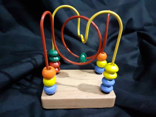 istock puzzle wooden wire  toy 1334035868