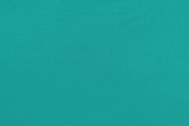 istock Green homogeneous background with a textured surface 1334040704