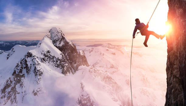 istock Rock Climbing Man Rappelling from a Cliff 1334045586