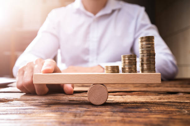 istock Money Leverage And Economy Balance 1334047547