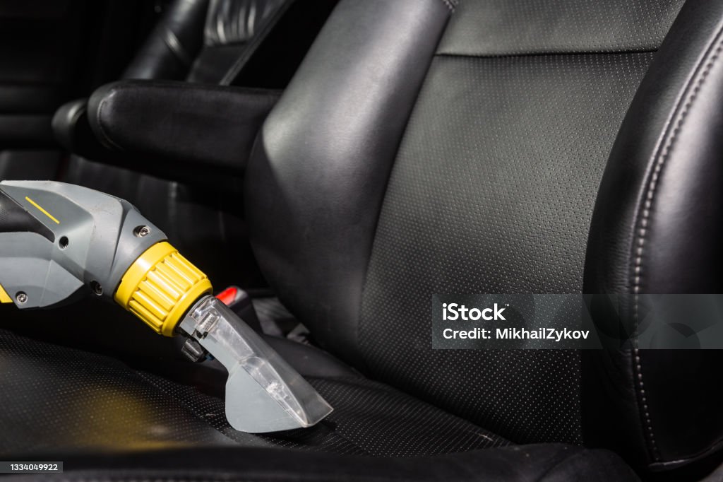 Car wash Car interior wash dry cleaning Bucket Stock Photo