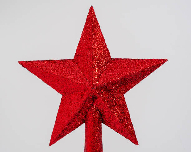 istock Christmas decorations isolated on white. Red star on a white background. 1334051006