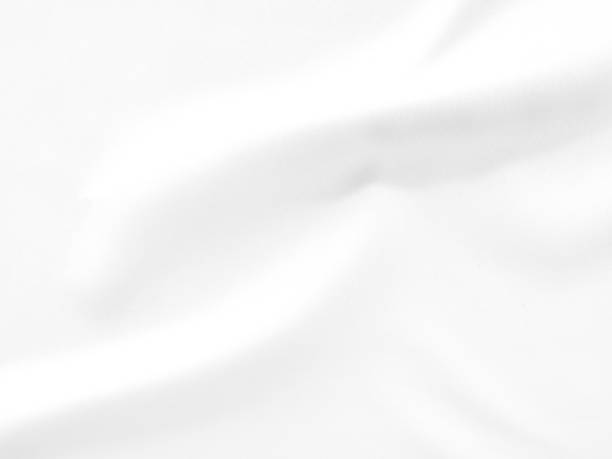 istock Abstract with soft waves of white fabric background. Space for your text or design. 1334060556