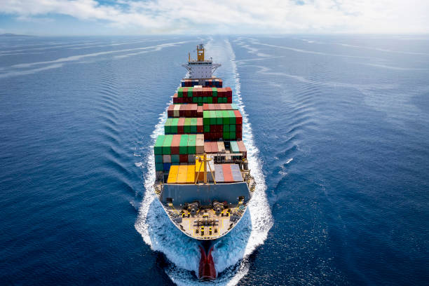 istock A loaded container cargo ship in full motion on open sea 1334061486
