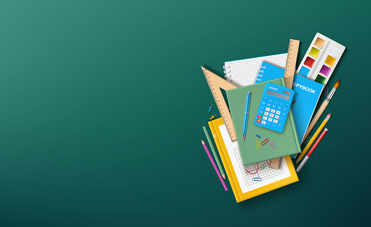 Vector illustration with school supplies.A school textbook, notebooks and other stationery on the background of a school green board.A template for a banner or congratulations on the beginning of the school year.Concept