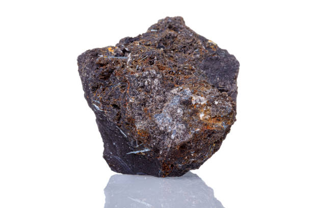 istock macro mineral stone Ilmenite on a white background 1334069790