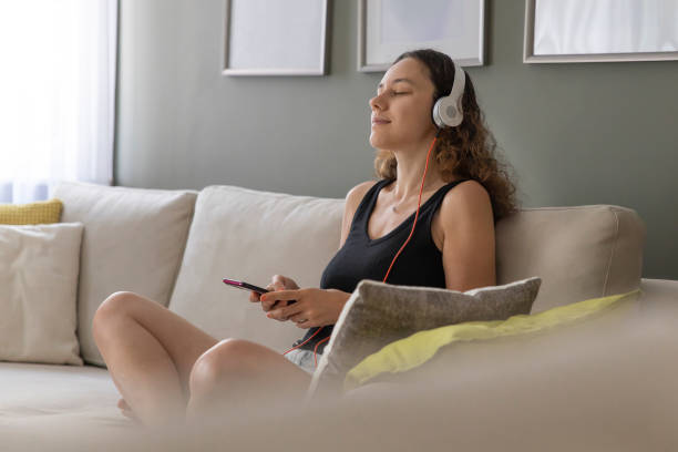 istock Young woman enjoying at home 1334072044