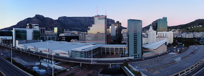 Aerial dawn drone panoramic cityscape of the skyline of downtown Cape Town, South Africa.