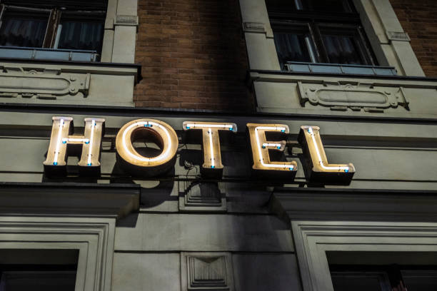 istock Illuminated sign of a hotel at night 1334084657