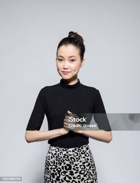 Friendly Asian Young Woman Stock Photo - Download Image Now - 20-24 Years, Adult, Adults Only