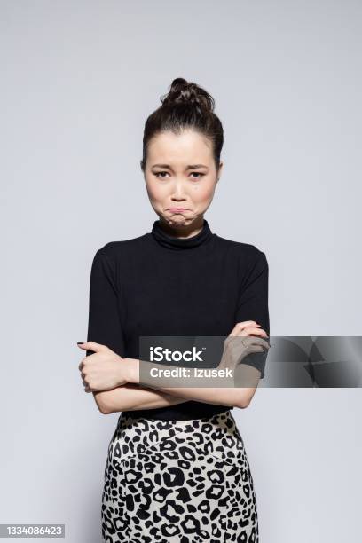 Sad Asian Young Woman Stock Photo - Download Image Now - Arms Crossed, Females, 20-24 Years