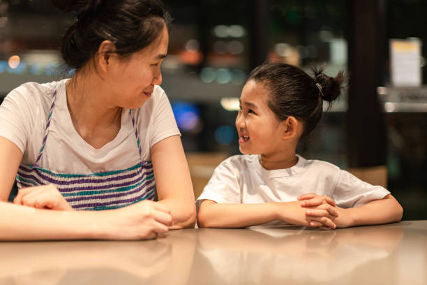 istock Mother and daughter are chatting 1334087937