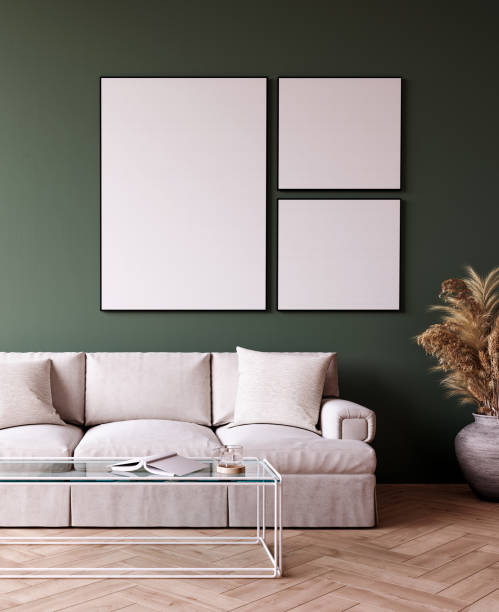 istock Modern mock up interior with empty picture frames and dry plants decoration 1334089590