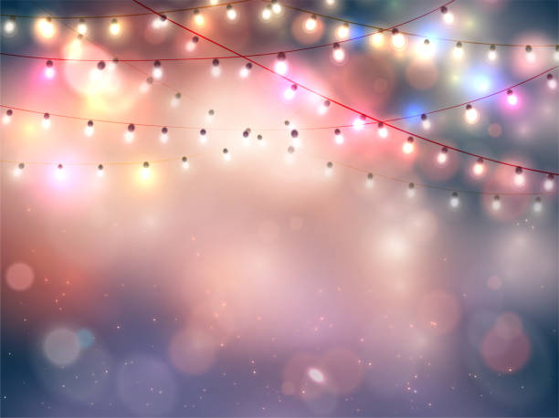 istock Happy new year. Abstract greeting background with bokeh, lights and christmas garland. Bright positive color. 1334091554